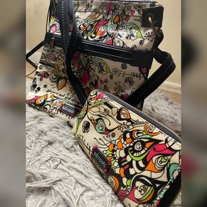 Selling cross body bag/wallet pair from Sakroots